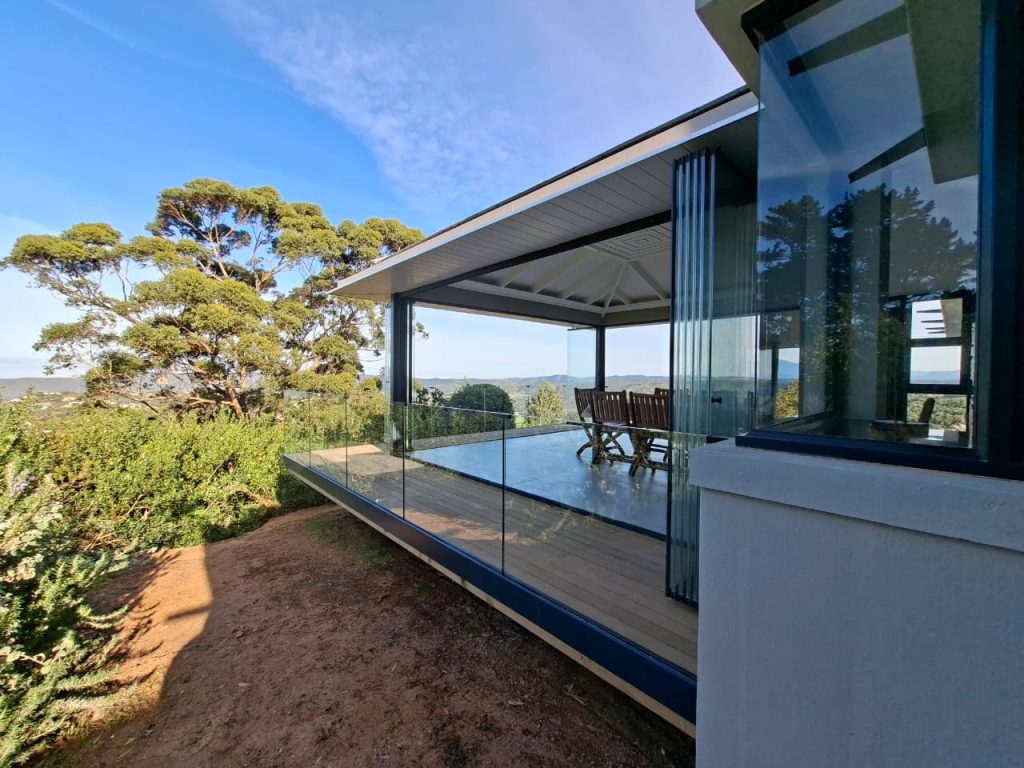 Frameless Sliding Stacking door Installed Knysna by Maxiview Frameless Glass Systems