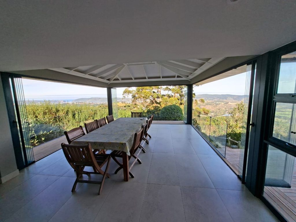 Frameless Sliding Stacking door Installed Knysna by Maxiview Frameless Glass Systems