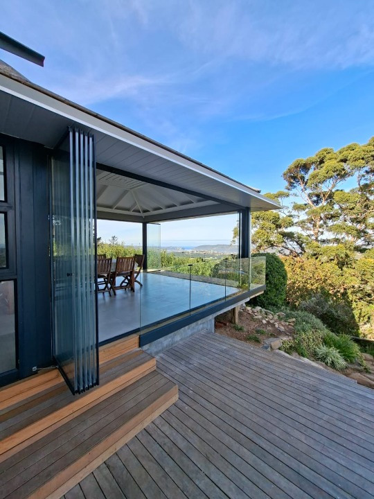 Frameless Sliding Stacking door Installed Knysna by Maxiview Frameless Glass Systems